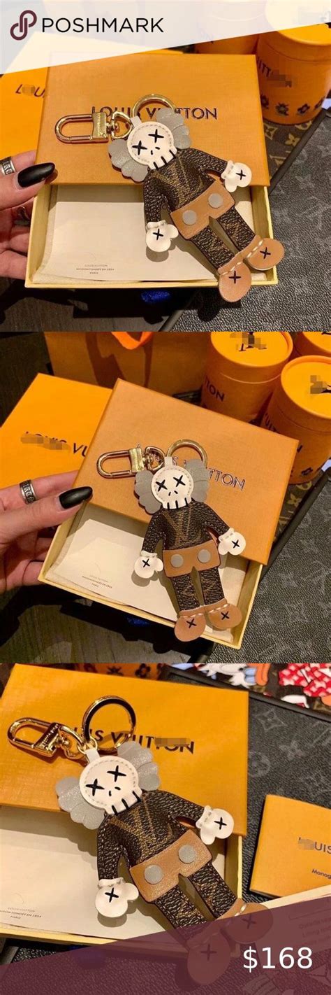 louis vuitton kaws keychain|authentic louis vuitton key pouch.